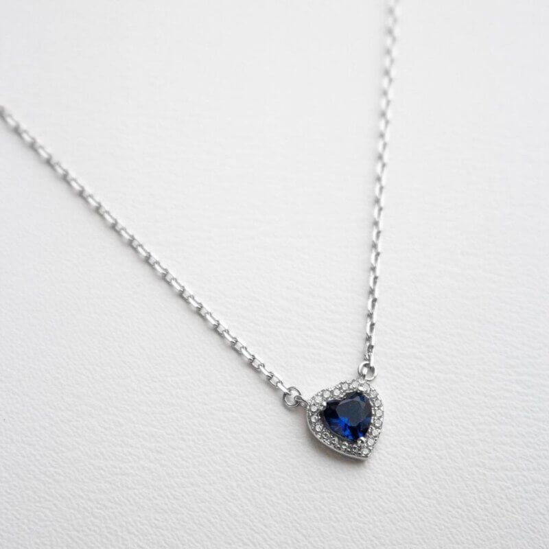 Срібне кольє та кулон «Серце» з синім та прозорим камінням