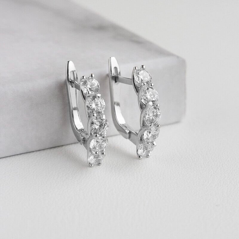 Срібні сережки з прозорим камінням