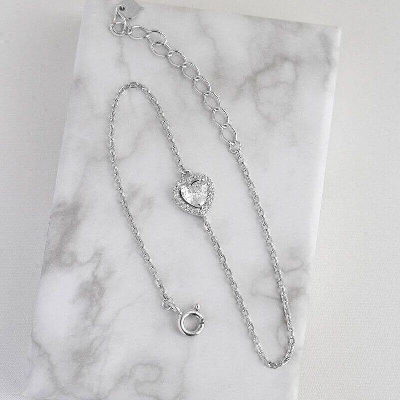 Срібний браслет Серце з білим камінцем