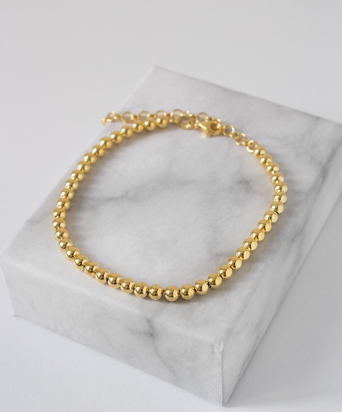 Срібний браслет Кульки в позолоті