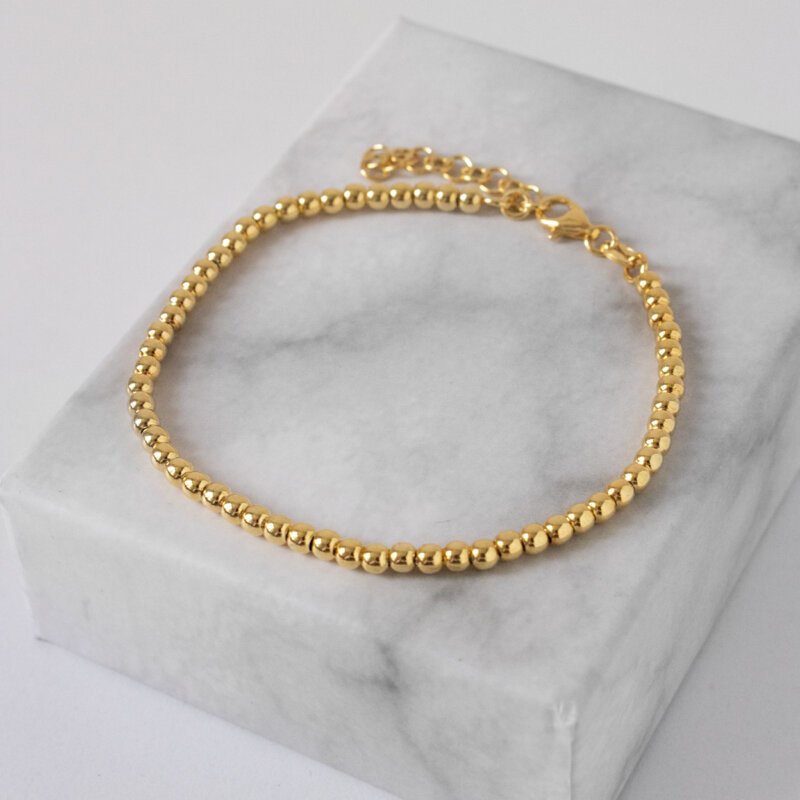 Срібний браслет Кульки в позолоті