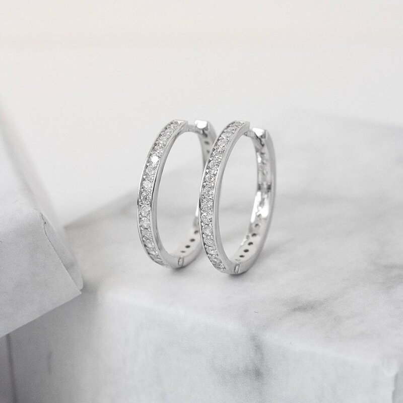 Срібні сережки-кільця з фіанітами